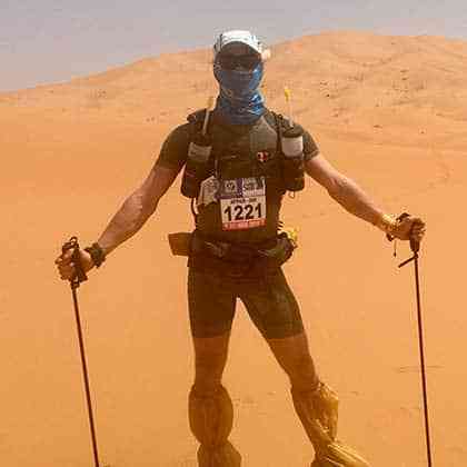 man standing in the desert