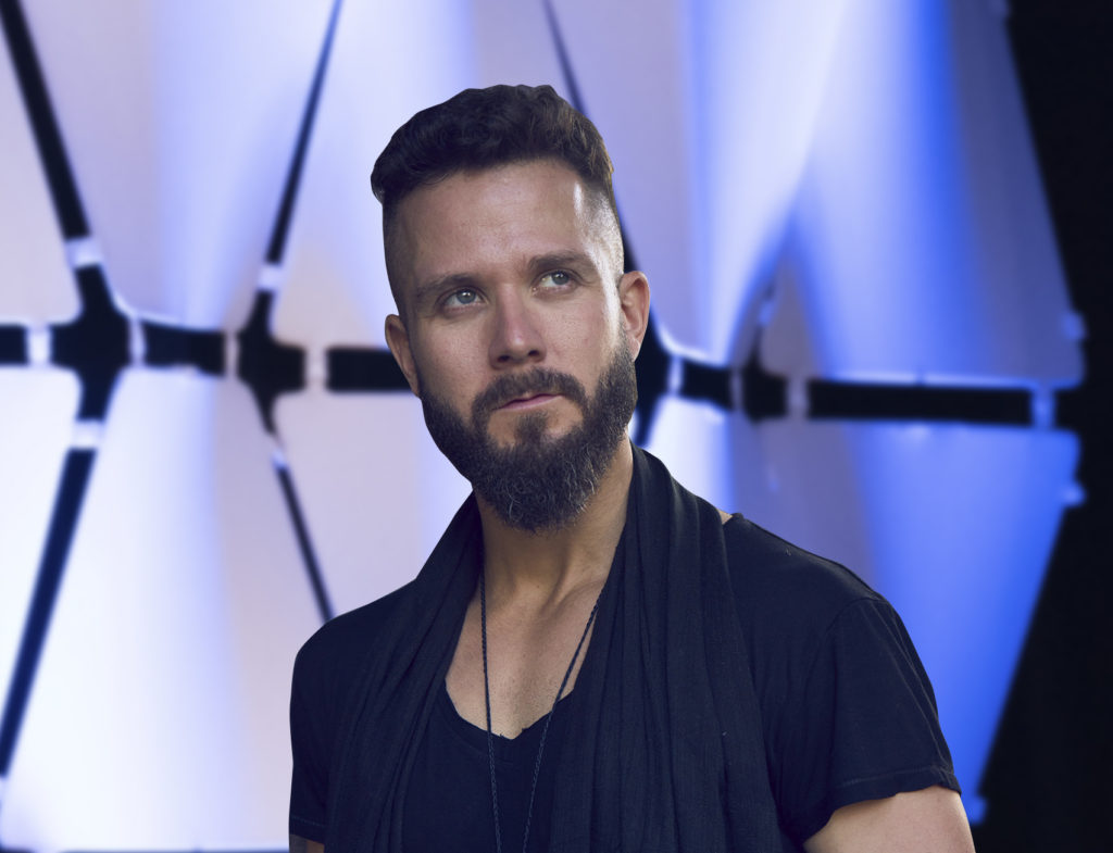 bearded man wearing black shirt