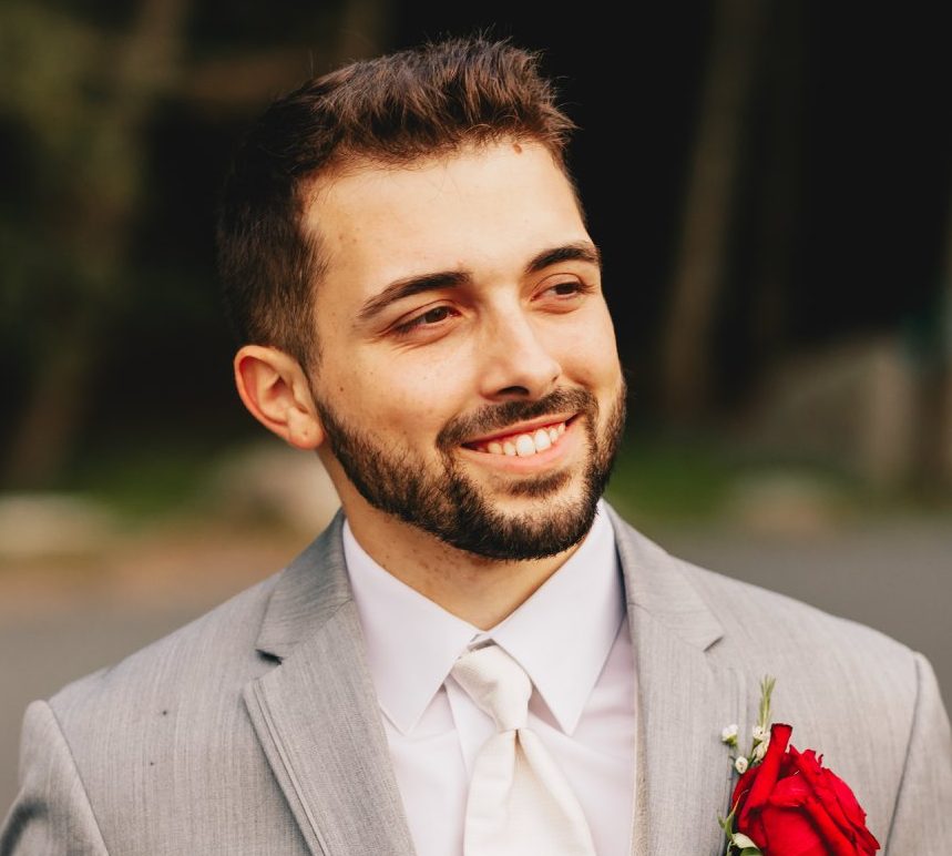 man in a formal  gray suit