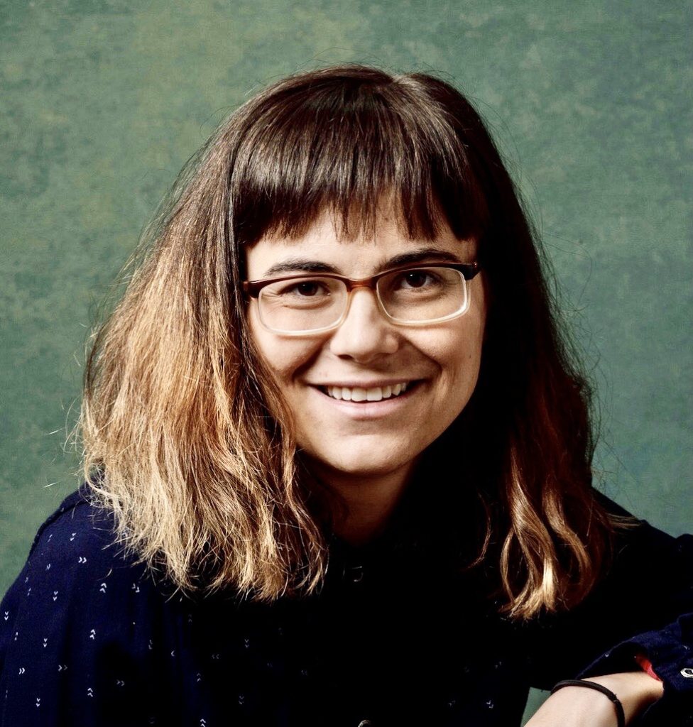 headshot of a woman wearing glasses