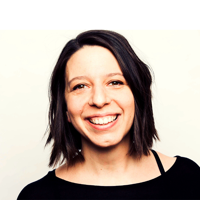 headshot photo of a woman smiling