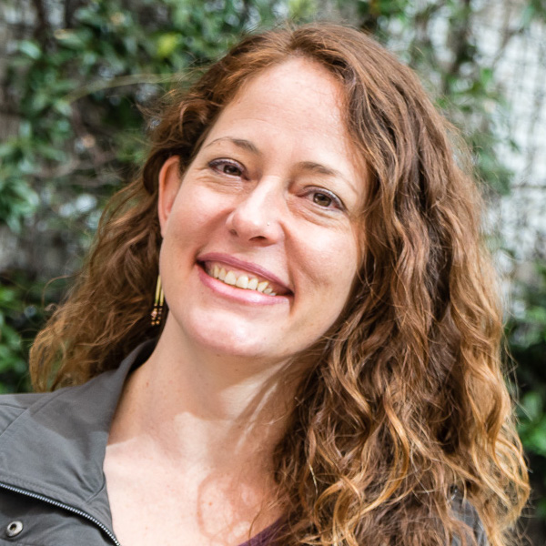 headshot photo of a woman smiling