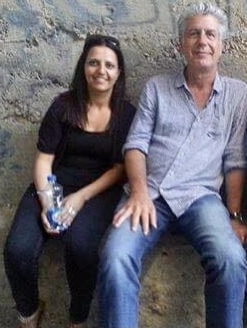 photo of a man and woman sitting and smiling