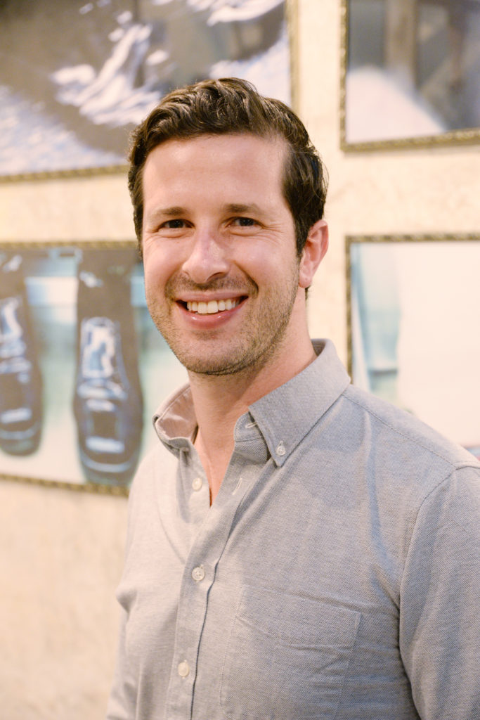 smiling man in a polo shirt