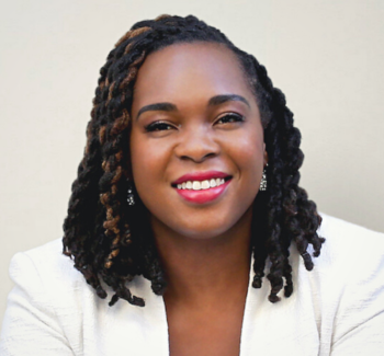 headshot photo of a woman smiling