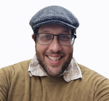 headshot of a man wearing glasses