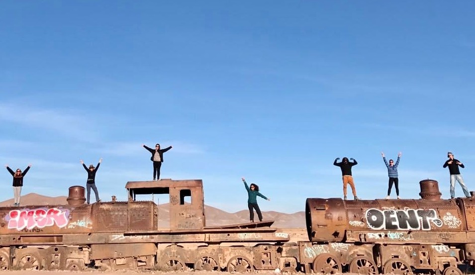 team in a train cemetery